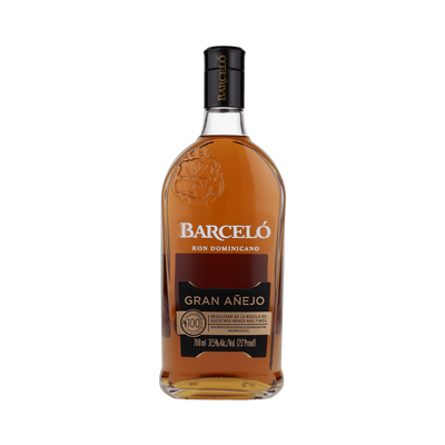 A bottle of Barceló Gran Añejo rum spirit on a plain white background. The clear glass bottle shows the amber-brown liquid inside, with a black cap and a label featuring white and gold text.